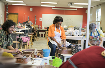 student in ceramics class