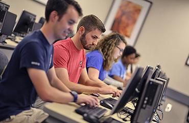 students working at computers