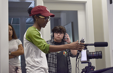 students shooting video