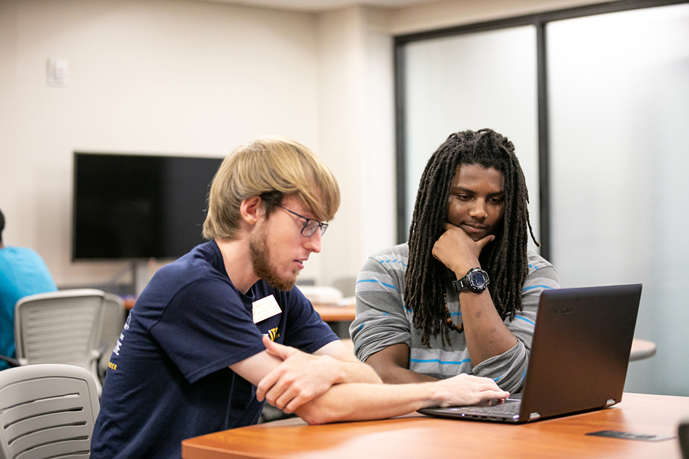 students on a computer