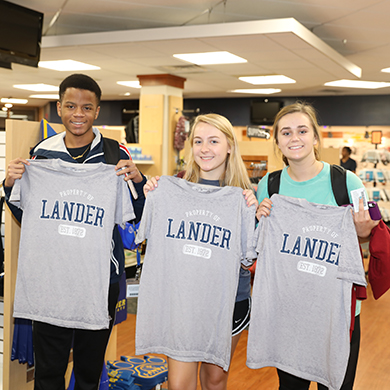 students with shirts from Bearcat Shop
