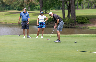 golf tournament participants