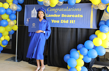 graduate at commencement