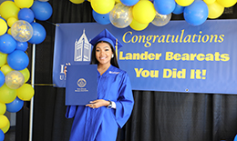 graduate at commencement