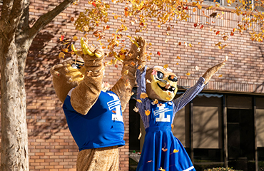 mr and mrs bearcat with leaves