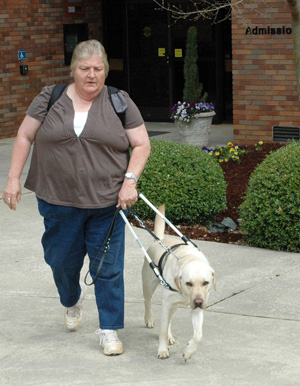 Andi Mills and her dog, Mr. Tibbs
