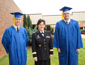 Capt. Thomas Funderburk, Brigadier General Darlene M. Goff, and Staff Sgt. Matthew Scruggs