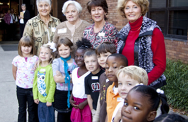 Greenwood Women's Club members with children