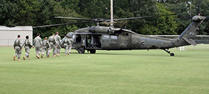 students boarding ROTC chopper