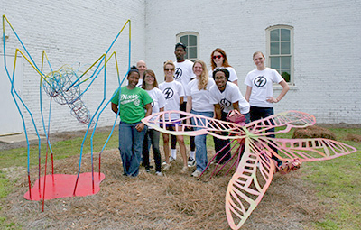 art students with bug sculptures