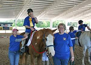 John Romaine on a horse