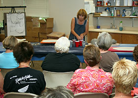 Carolyn Genders demonstrates her techniques