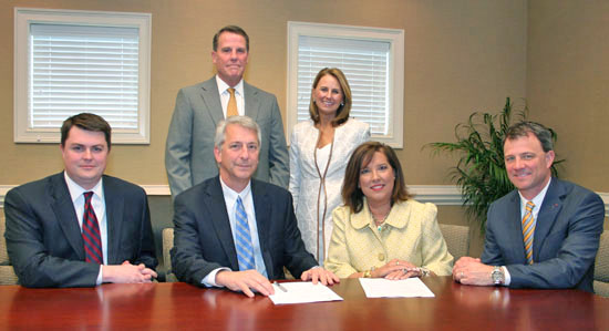 signing for First Citizens scholarship