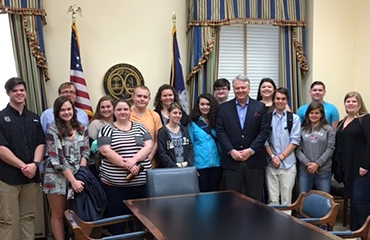 state treasurer with students