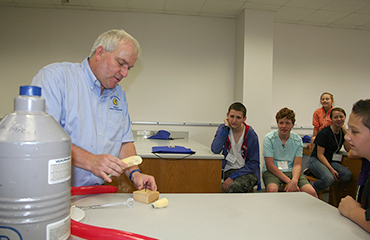 david slimmer gives demonstration at summer physics camp
