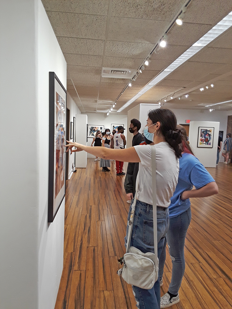 students looking at art