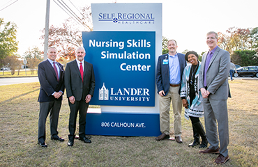 Unveiling of sign at Nursing Skills Simulation Lab
