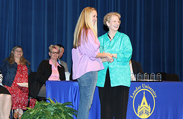 Lacey Pileggi receiving award