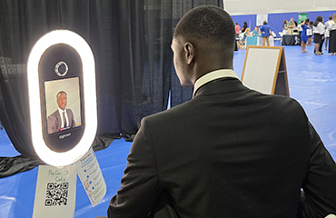 student taking headshot