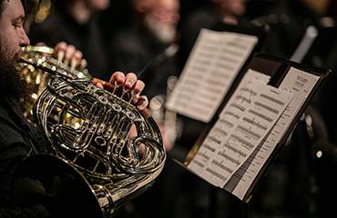 student playing instrument