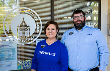 Tonya Gurganus and Adam Beasley deliver food