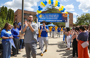 Coach Omar Wattad with team at sendoff