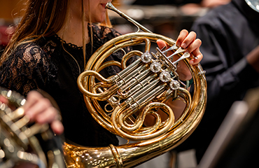 student playing instrument
